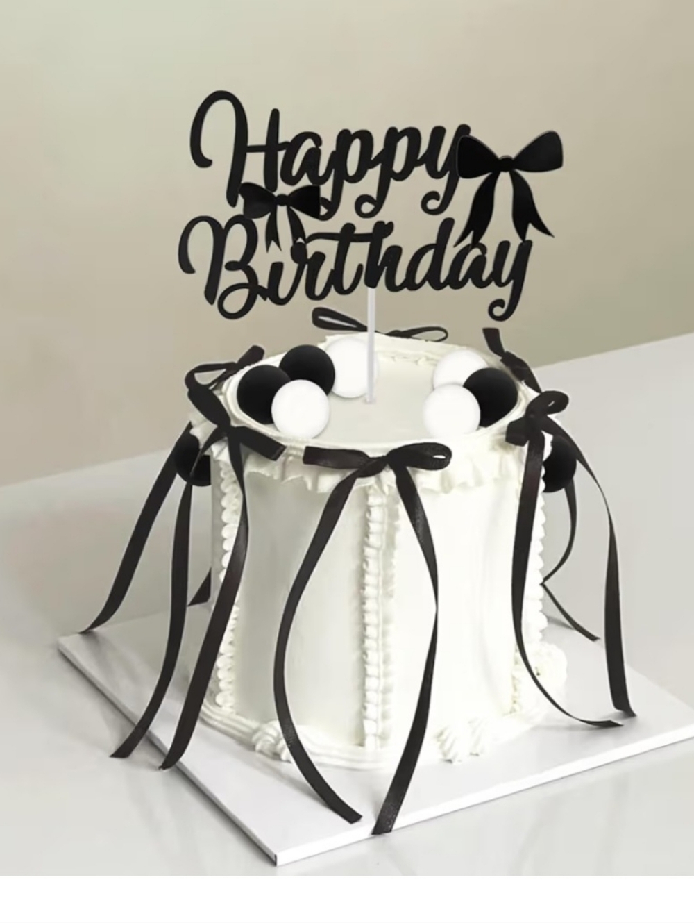 Black "Happy Birthday" Cake Topper with Ribbon Accents - Party Supplies